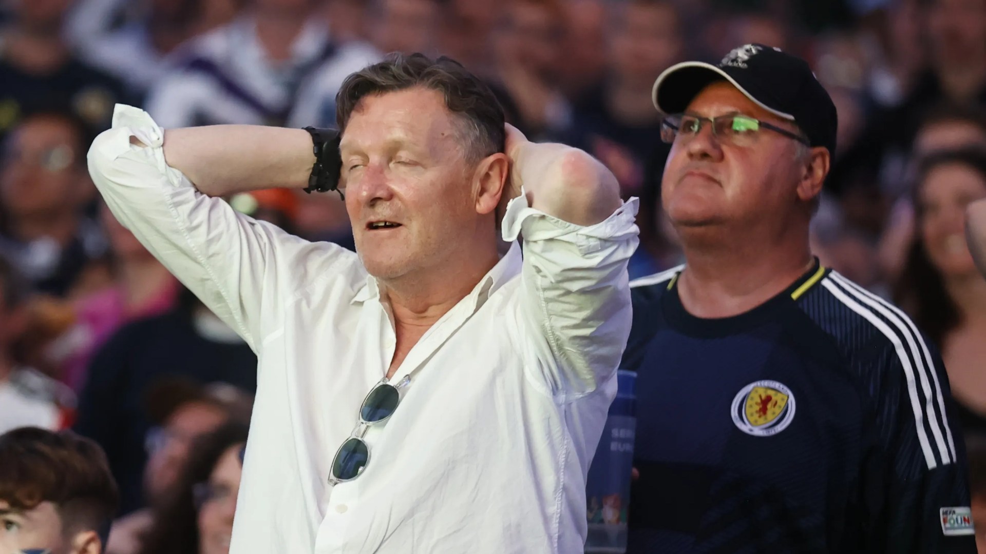 Scotland's Devastating Half: Fans Leave Allianz Arena in Disappointment
